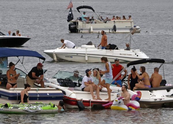 Boaters gather at the confluence of the Allegheny, Monongahela, and Ohio Rivers in downtown Pittsburgh, Pa., on June 26, 2020. Cases of the novel coronavirus hit a new high on Saturday in Allegheny County on Saturday, with 90 new cases reported. Gene J. Puskar/AP