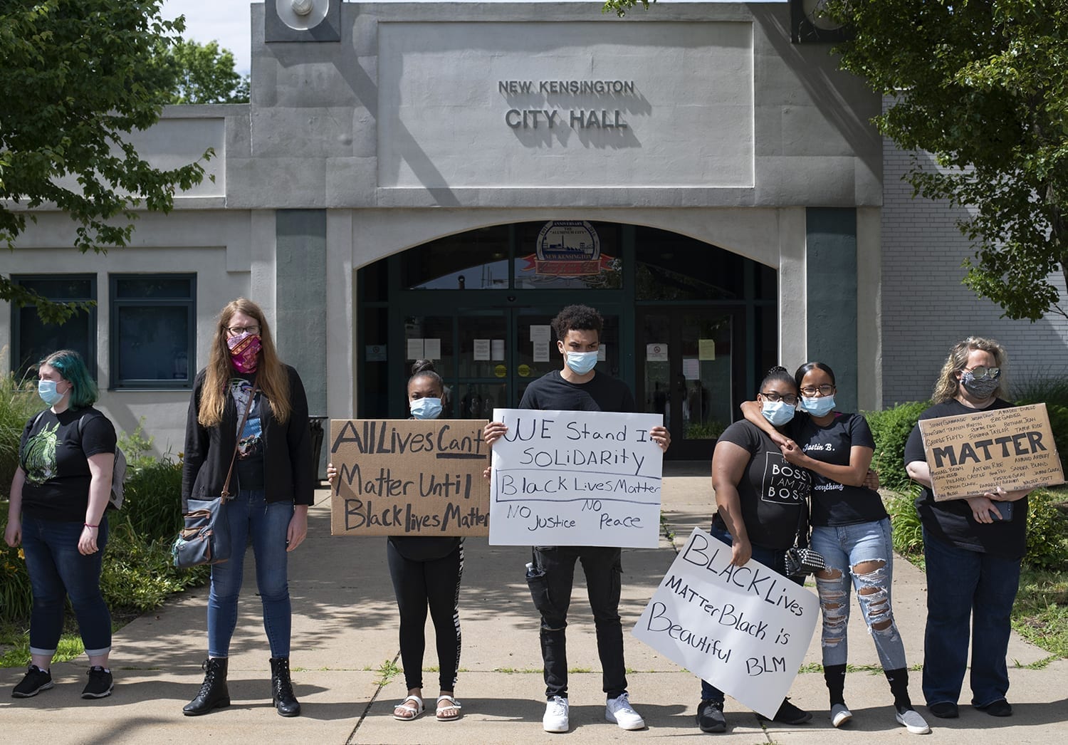 Protestors line up around City Hall for a silent 8:46 minutes to remember George Floyd following a peaceful protest for Black Lives Matter in New Kensington, Pa. (Photograph/Martha Rial)