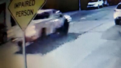 Police are seeking information about this white pickup truck, shown from video of the incident in Lawrenceville. (Photograph provided by Pittsburgh Public Safety)