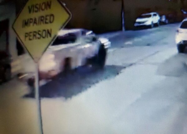 Police are seeking information about this white pickup truck, shown from video of the incident in Lawrenceville. (Photograph provided by Pittsburgh Public Safety)