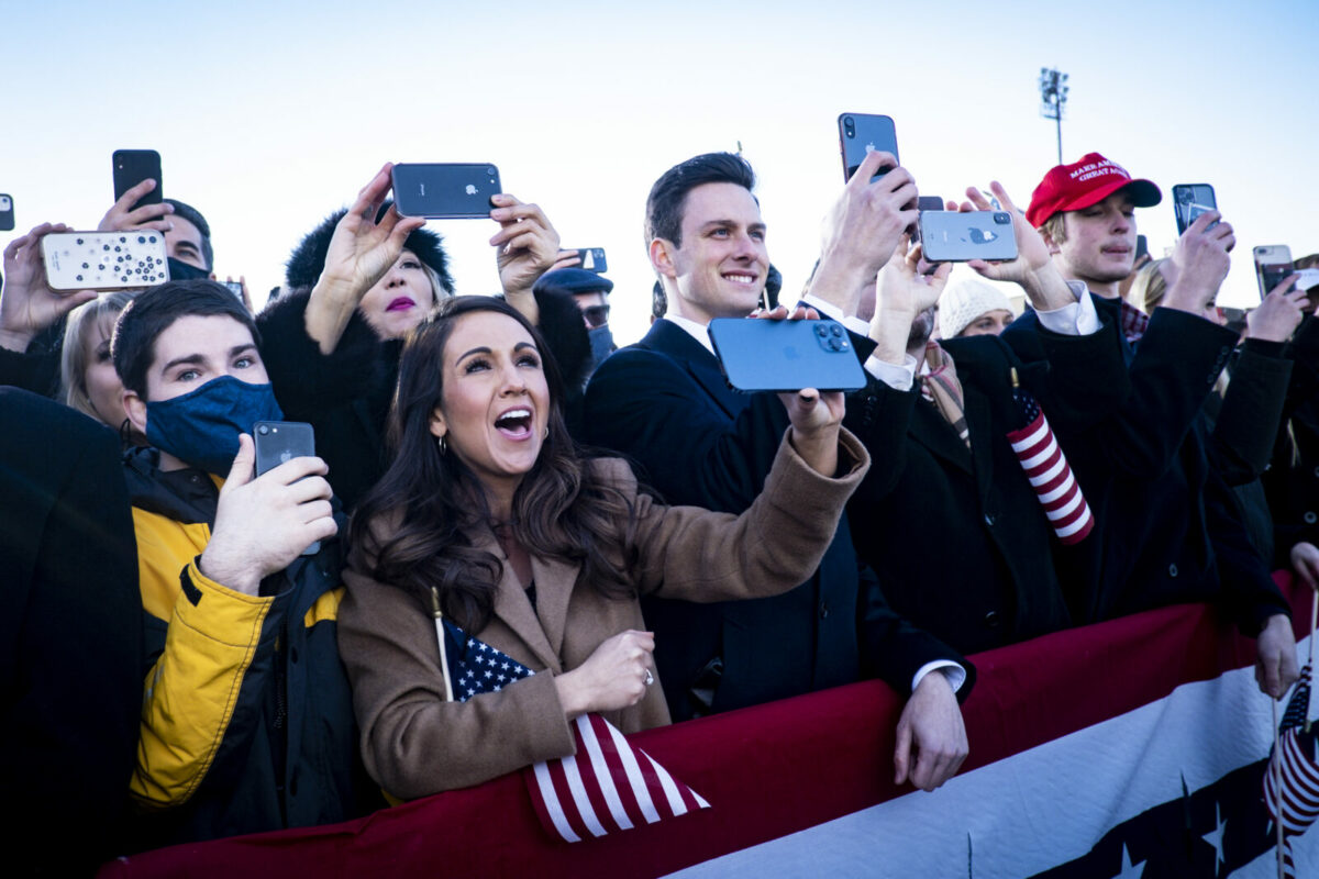 Newly elected Rep. Lauren Boebert (R-CO) listens to President Donald Trump speak to supporters at Joint Base Andrews before boarding Air Force One for his last time as President on January 20, 2021. Trump is traveling to his Mar-a-Lago Club in Palm Beach, Fla.