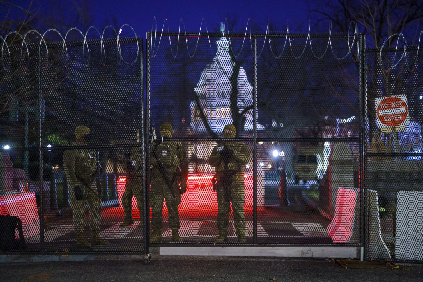 National Guard troops reinforce the security zone on Capitol Hill in Washington, Tuesday, Jan. 19, 2021, before President-elect Joe Biden is sworn in as the 46th president on Wednesday. (AP Photo/J. Scott Applewhite)
