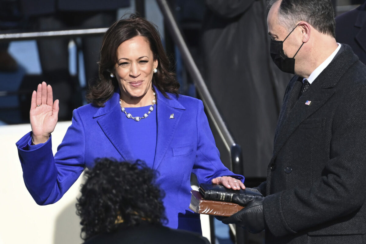 Kamala Harris is sworn in as vice president by Supreme Court Justice Sonia Sotomayor as her husband Doug Emhoff holds the Bible during the 59th Presidential Inauguration at the U.S. Capitol in Washington, Wednesday, Jan. 20, 2021.(Saul Loeb/Pool Photo via AP)