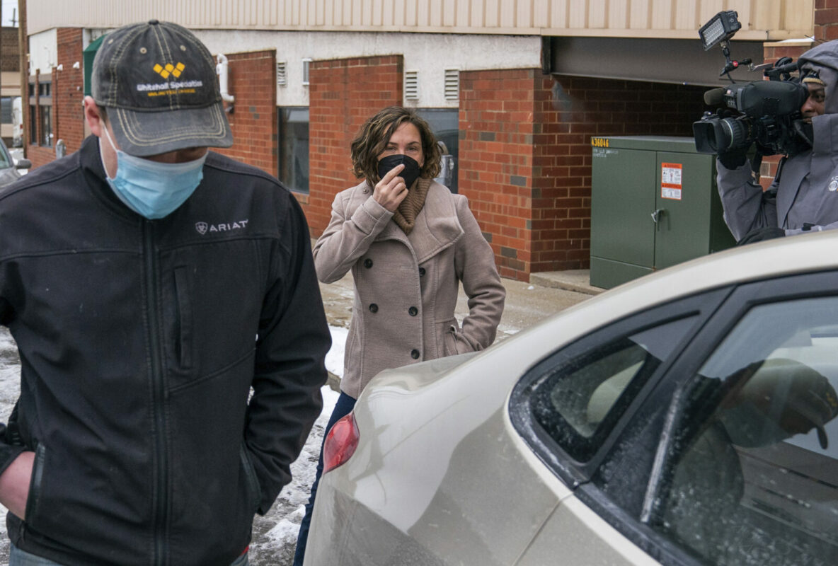 Accused Capitol rioter Rachel Powell heads to a vehicle being released from Butler County Prison on Friday, Feb. 12, 2021, in Butler, Penn. A federal judge in the D.C. District rejected an appeal from federal prosecutors seeking to keep Powell in custody while she awaits trial on charges stemming from the Capitol siege. (Andrew Rush /Pittsburgh Post-Gazette via AP)