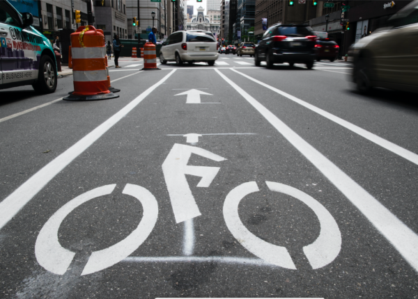 Shown is a bicycle lane along Market Street in Philadelphia in 2018. (AP Photo/Matt Rourke). People in more cities, including those in North Carolina are pressing for bike-friendly roads.