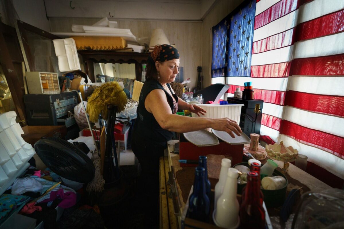 Sandra Huffman, shown here at her home in East Greenville, Montgomery County, has been unemployed since the spring, when she got sick while working a hospital cleaning job. She has been receiving money from the coronavirus assistance fund, but has struggled during a monthlong gap in benefits. (Jessica Griffin / Philadelphia Inquirer)