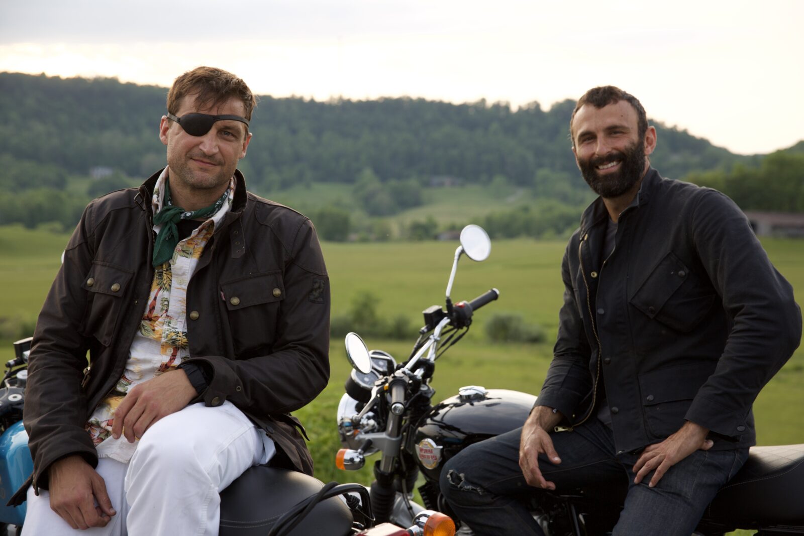 Journalists Carmen Gentile and Jason Motlagh at New River Gorge National Park in Fayetteville, W.Va., on Sunday, May 23, 2021. They're riding Royal Enfield motorcycles through the Rust Belt & Appalachia. Motlagh is on assignment for Rolling Stone. (Photograph by Matt Cipollone)