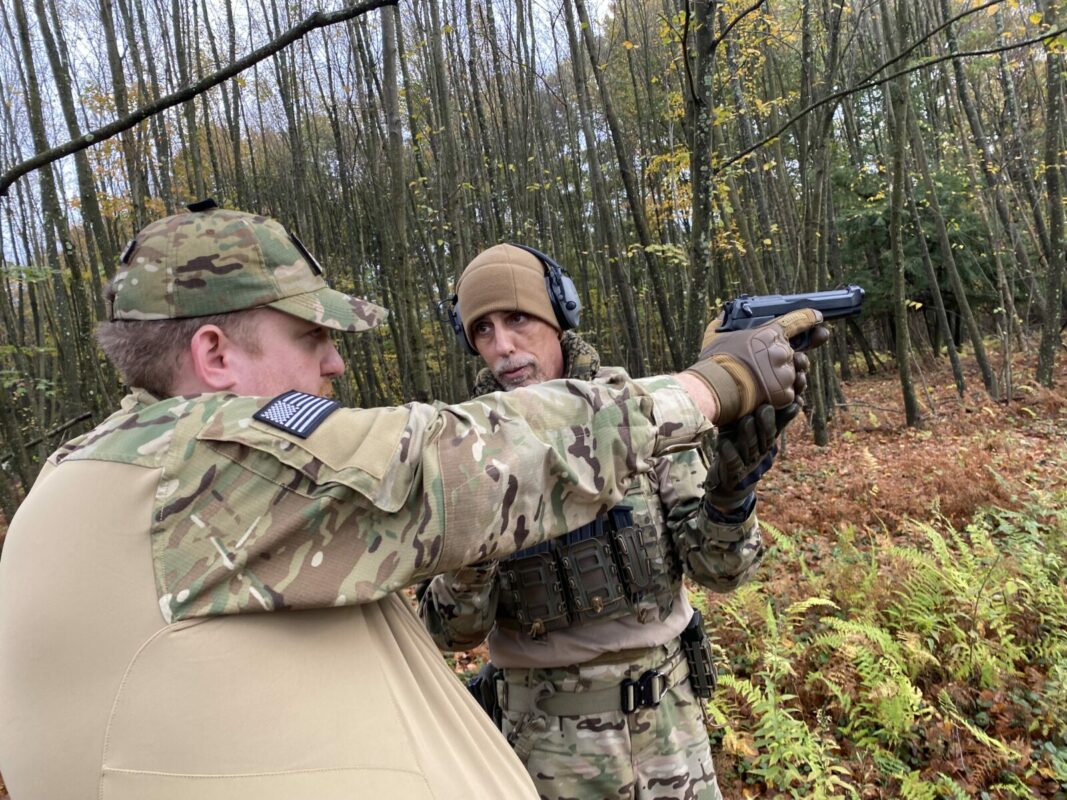 Christian Yingling, right, leads a shooting drill during a training weekend for his Pennsylvania Volunteer Militia in October. Yingling leads the militia and has taken fellow militia members to volatile rallies across the country, including the deadly Charlottesville, Va., clash between white supremacists and left-wing counter-protesters