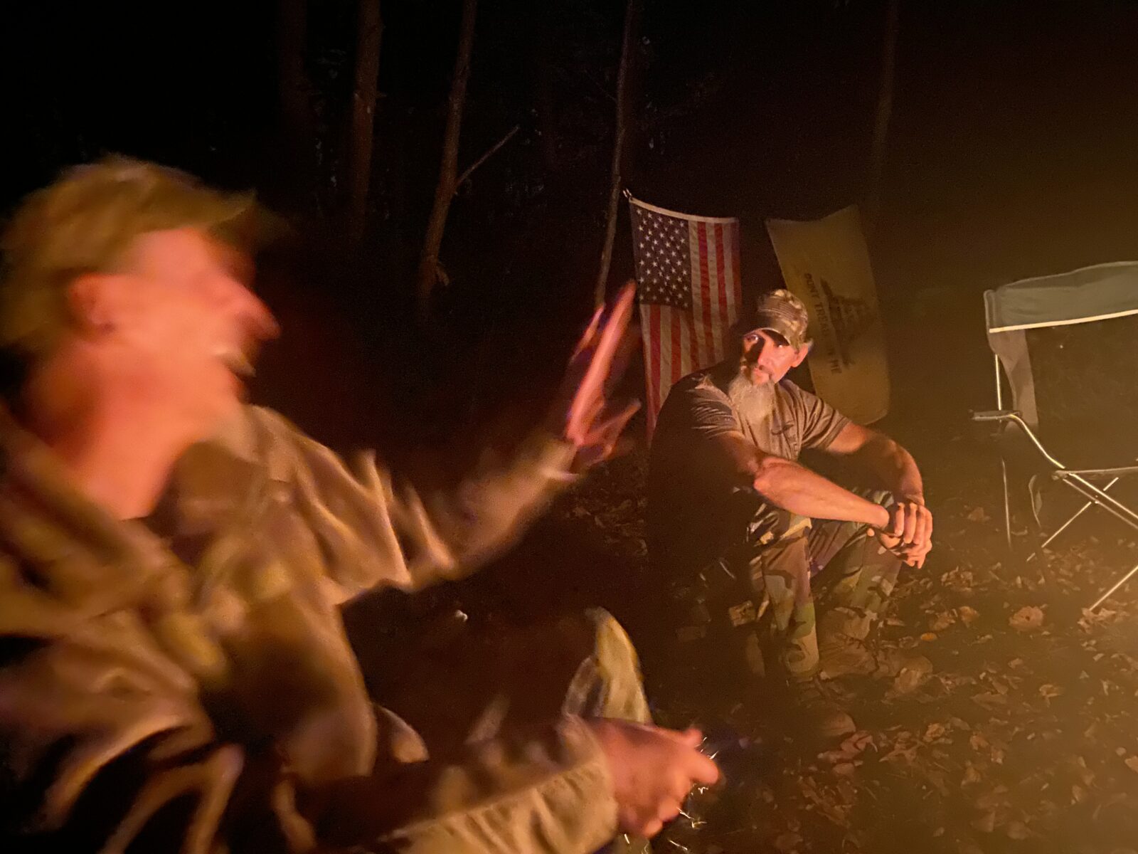 Members of the Pennsylvania Volunteer Militia tell stories around the campfire during their monthly training weekend in October. The militia’s leader says the group’s goal is to protect the Constitution and free speech.