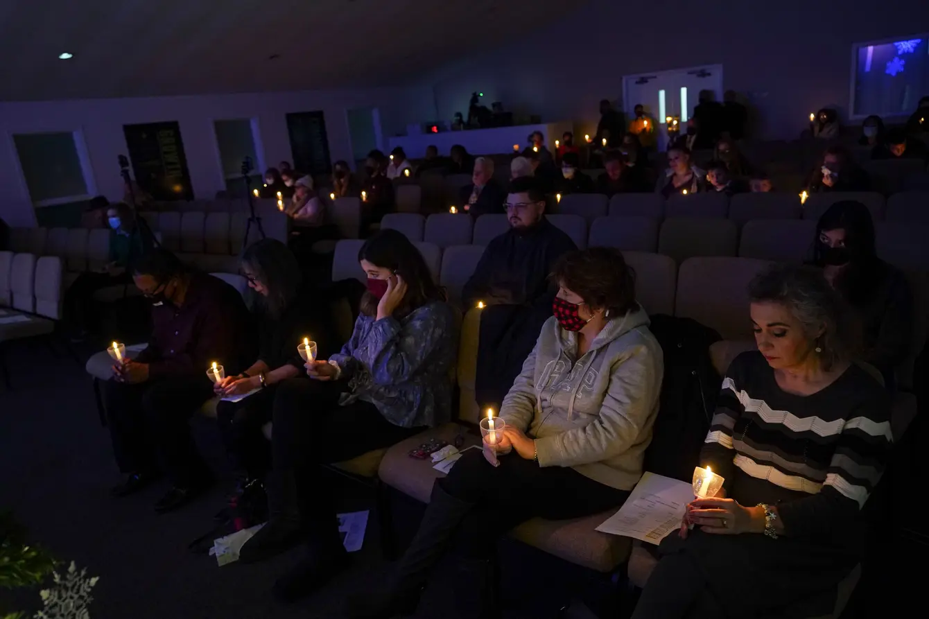 Attendees participate in a vigil for Christian Hall at Pleasant Valley Assembly of God in Brodheadsville. Hall was killed one year ago by Pennsylvania State Police. (Matt Smith / For Spotlight PA)