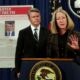 Acting AAG for National Security Mary McCord speaks in front of a poster of a suspected Russian hacker during FBI National Security Division and the U.S. Attorney's Office for the Northern District of California joint news conference at the Justice Depart