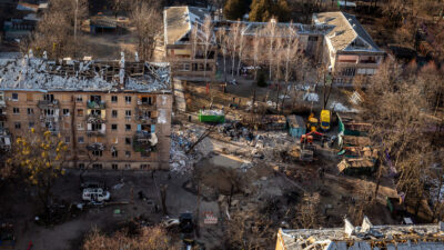 March 19: A Russian rocket attack destroyed apartments in the Vitryani Hory neighborhood of Kyiv, killing one man and injuring five, including children. Volunteers and residents work to clean up the aftermath.