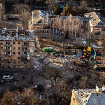 March 19: A Russian rocket attack destroyed apartments in the Vitryani Hory neighborhood of Kyiv, killing one man and injuring five, including children. Volunteers and residents work to clean up the aftermath.