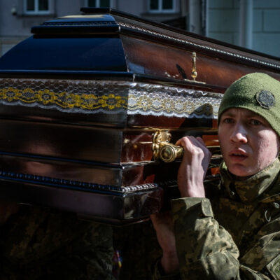 Ukrainain soldiers carrying the casket of one of the 35 soldiers killed from the Sunday morning bombing of the International Peacekeeping and Security Center in Yavoriv outside of Lviv near the border with Poland. A funeral was held for three of those killed at the Church of the Most Holy Apostles Peter and Paul in Lviv, Ukraine.