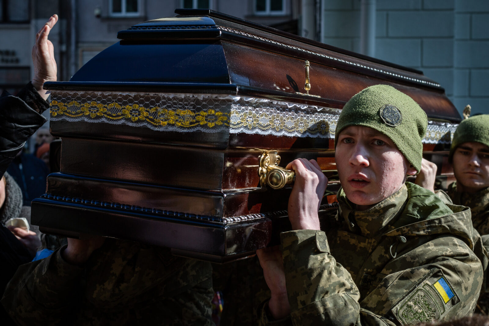 Ukrainain soldiers carrying the casket of one of the 35 soldiers killed from the Sunday morning bombing of the International Peacekeeping and Security Center in Yavoriv outside of Lviv near the border with Poland. A funeral was held for three of those killed at the Church of the Most Holy Apostles Peter and Paul in Lviv, Ukraine.