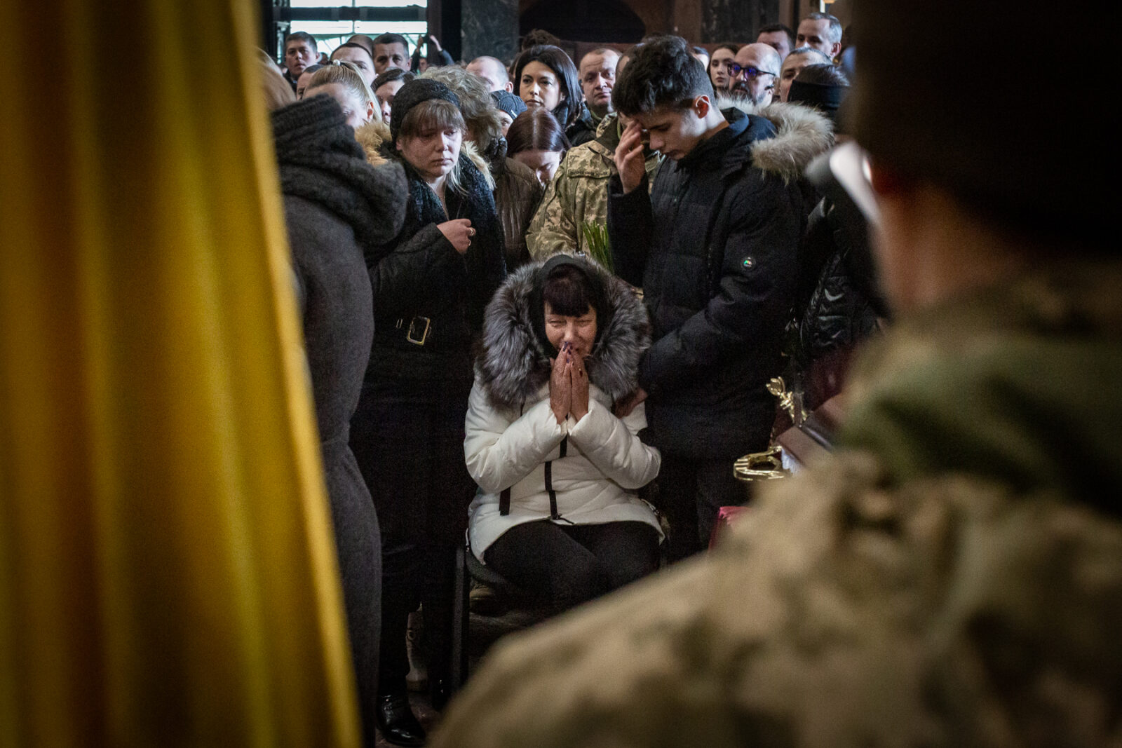 The mother of one of the 35 soldiers killed from the Sunday morning bombing of the International Peacekeeping and Security Center in Yavoriv outside of Lviv near the border with Poland. A funeral was held for three of those killed at the Church of the Most Holy Apostles Peter and Paul in Lviv, Ukraine.