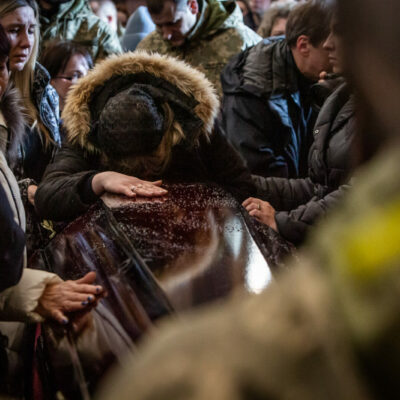 A relative of one of the 35 soldiers killed from the Sunday morning bombing of the International Peacekeeping and Security Center in Yavoriv outside of Lviv near the border with Poland. A funeral was held for three of those killed at the Church of the Most Holy Apostles Peter and Paul in Lviv, Ukraine.