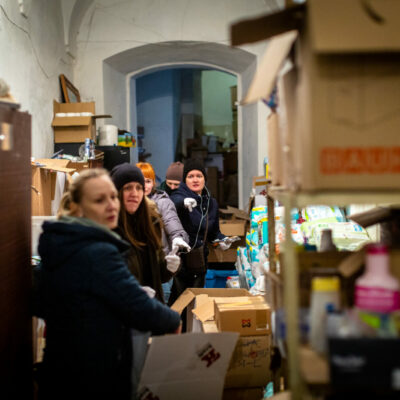 Volunteers at St. George Catholic Cathedral in Lviv, Ukraine prepare supplies to send to cities in the east.