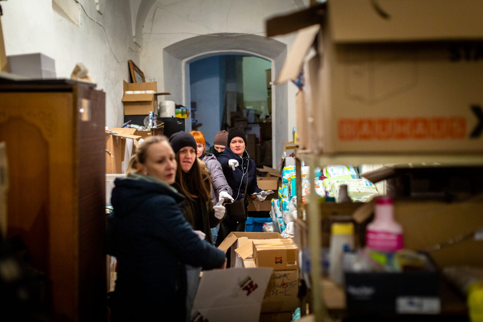 Volunteers at St. George Catholic Cathedral in Lviv, Ukraine prepare supplies to send to cities in the east.