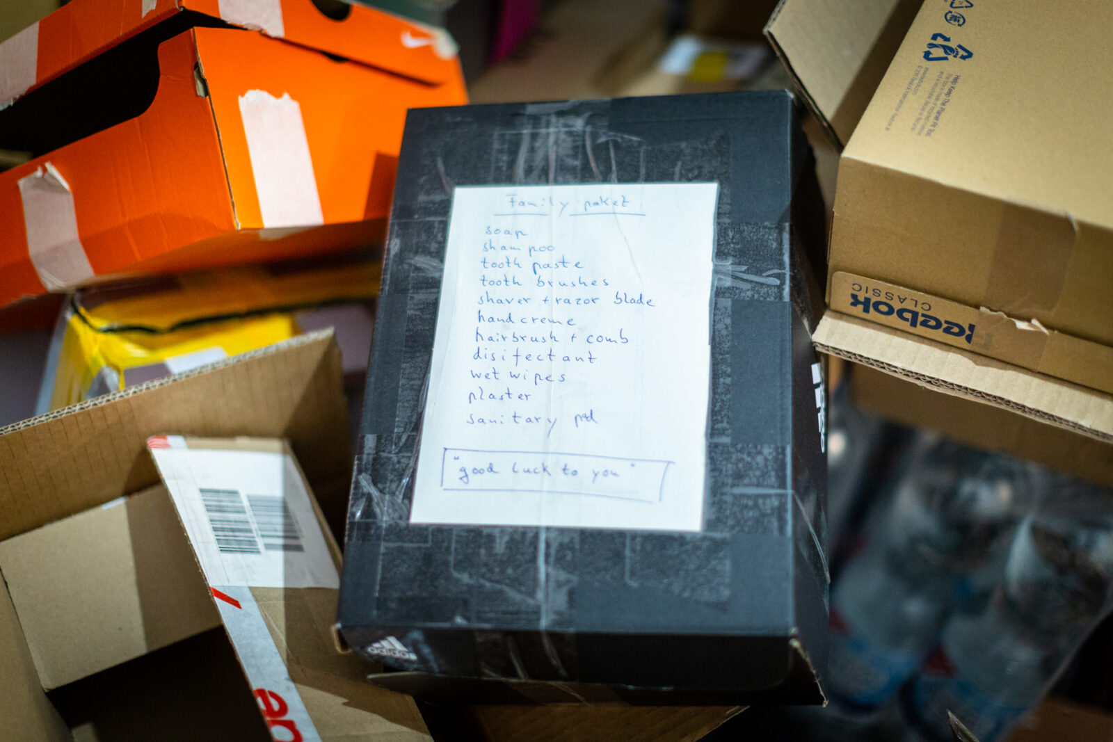 A box of supplies from the US at St. George Catholic Cathedral in Lviv, Ukraine as volunteers prepare to send supplies to send to cities in the east.