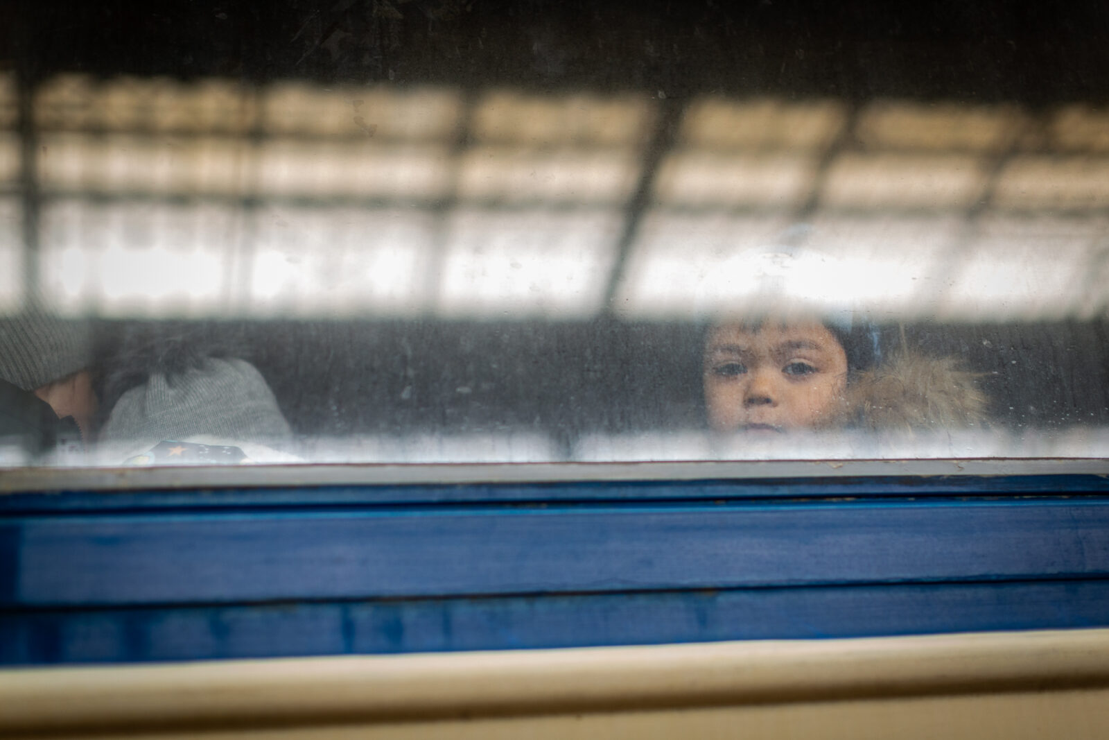 Ukrainians fleeing from the fighitng pass through Lviv Train Station on their way to neighboring European countries.