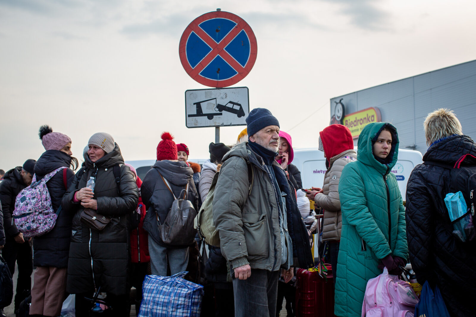 Ukrainian refugees who just crossed the border into Medyka, Poland