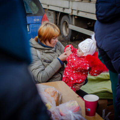 Ukrainian refugees who just crossed the border into Medyka, Poland