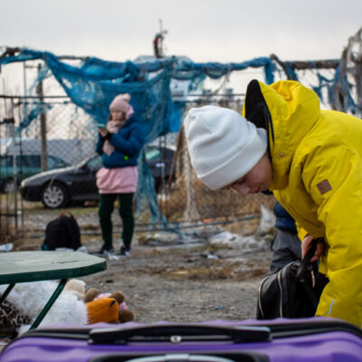 Ukrainian refugees who just crossed the border into Medyka, Poland