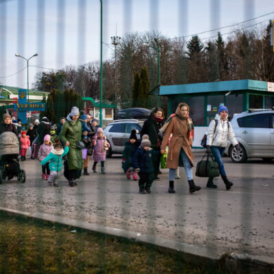 Ukrainian refugees crossing the border into Medyka, Poland