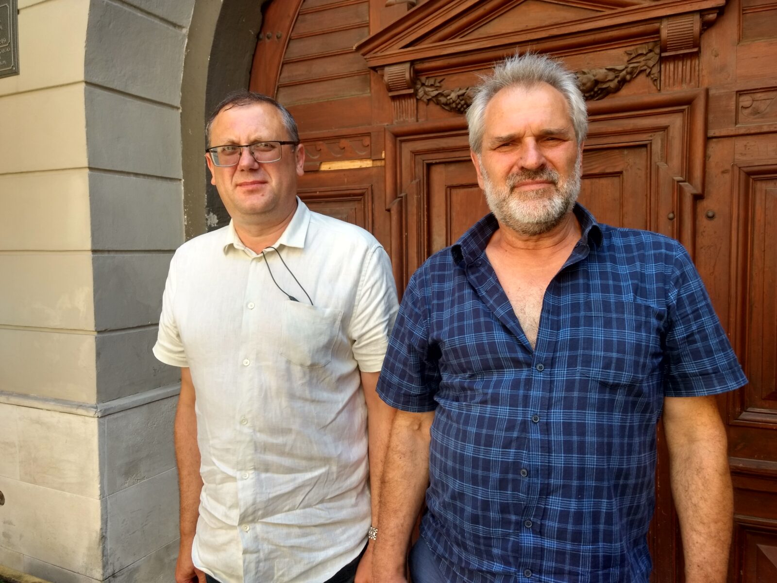 Vasyl Prokopyshyn (left) and Serhiy Verbytskyi in Lviv, Ukraine, on July 1, 2022. Verbytskyi's brother Yuriy is remembered as the first casualty of Putin's "forever war." Prokopyshyn went to Kyiv in early 2014 to join Yuriy and others on the Euromaidan.