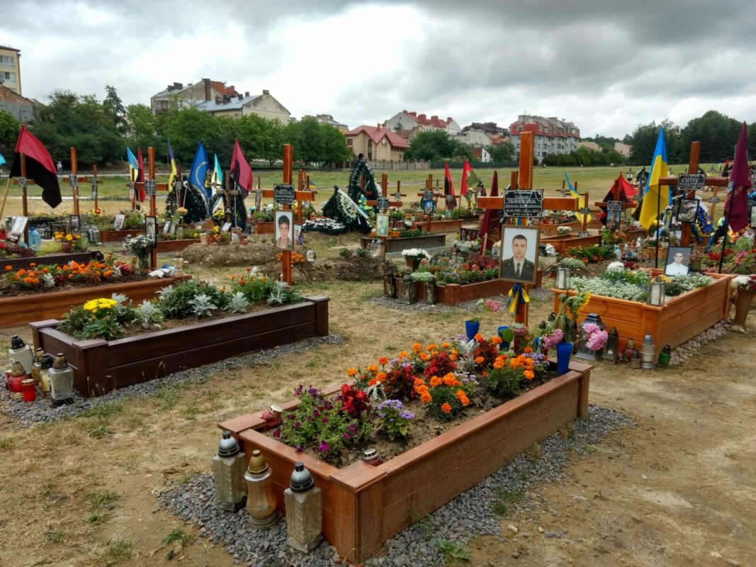 The graves of Ukrainian soldiers killed since the Russian invasion began Feb. 24 at Lychakiv cemetery in Lviv, Ukraine, on July 6, 2022. Photograph by Martin Kuz