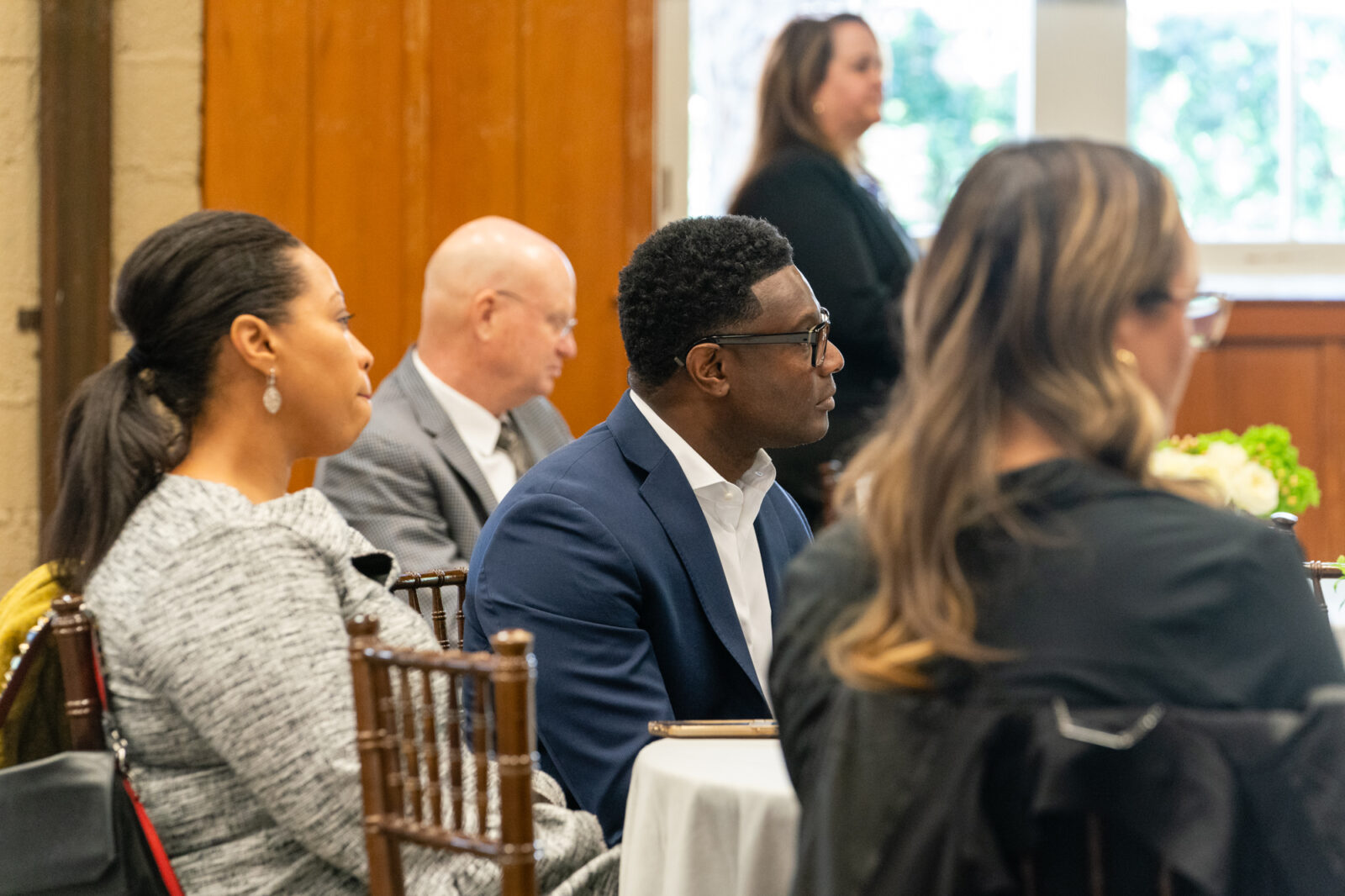 Jessica Brooks, center, and Marlin Brooks, during Advancing Ambition, a live event with panel discussions focused on cybersecurity, and the need for more job training in this area, at Piedmont Park, on Tuesday, Oct. 18.