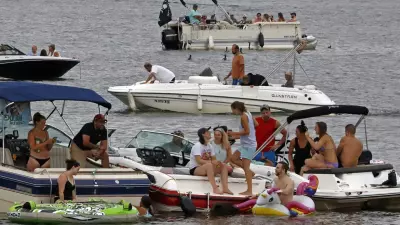 Boaters gather at the confluence of the Allegheny, Monongahela, and Ohio Rivers in downtown Pittsburgh, Pa., on June 26, 2020. Cases of the novel coronavirus hit a new high on Saturday in Allegheny County on Saturday, with 90 new cases reported. Gene J. Puskar/AP