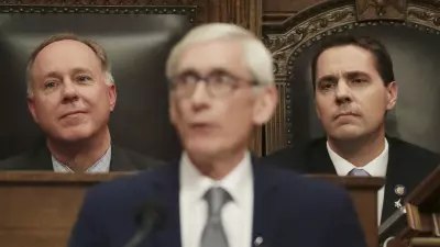 In this Jan. 22, 2020, file photo, Wisconsin Assembly Speaker Robin Vos, R-Rochester, left, and Wisconsin Senate President Roger Roth, R-Appleton, right, look on as Gov. Tony Evers delivers his State of the State address at the Wisconsin state Capitol in Madison, Wis. Gov. Evers signed a bipartisan tax cut bill into law on Feb. 18, 2021, and signaled support for another bipartisan measure to help update the state's unemployment insurance system, rare compromises that come as Republicans have roundly denounced much of his state budget proposal as a liberal wish list. (Amber Arnold/Wisconsin State Journal via AP, File)