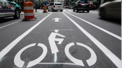 Shown is a bicycle lane along Market Street in Philadelphia in 2018. (AP Photo/Matt Rourke). People in more cities, including those in North Carolina are pressing for bike-friendly roads.