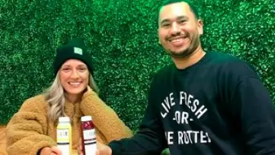 Catey Burget, left, and Brett Gilliam right, owners of Live Fresh Juice + Smoothie Bar in Homestead just outside of Pittsburgh.