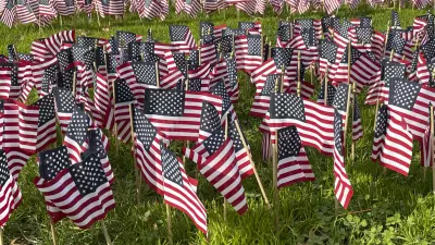 Photo by: STRF/STAR MAX/IPx 2021 11/7/21 A Veteran's Day Memorial tribute is seen in Stuyvesant Town in Manhattan. Hundreds of flags spelled out the word 'PROUD' in honor of American Vets.